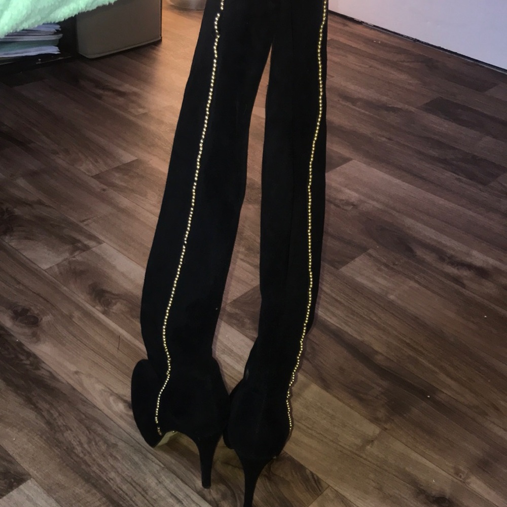 Black high thigh boots